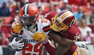 Cleveland Browns running back Duke Johnson (29) is tackled by Washington Redskins defensive back Su&#39;a Cravens (36) during the first half of an NFL football game, Sunday, Oct. 2, 2016, in Landover, Md. (AP Photo/Carolyn Kaster) ** FILE **