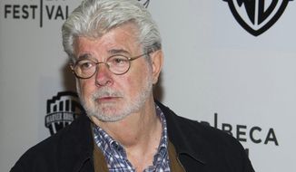 FILE - In this April 17, 2015, file photo, filmmaker George Lucas attends the Tribeca Film Festival in New York. Lucas, the creator of the &amp;quot;Star Wars&amp;quot; movie empire, has donated about $1.5 million to the Norman Rockwell Museum. The museum said in a statement dated Sept. 29, 2016, that Lucas is an avid collector of Rockwell pieces and shares in the museum’s belief that the illustrator’s art transcends generations and cultures, communicating universal ideals related to community, family, and human rights. (Photo by Charles Sykes/Invision/AP, File)