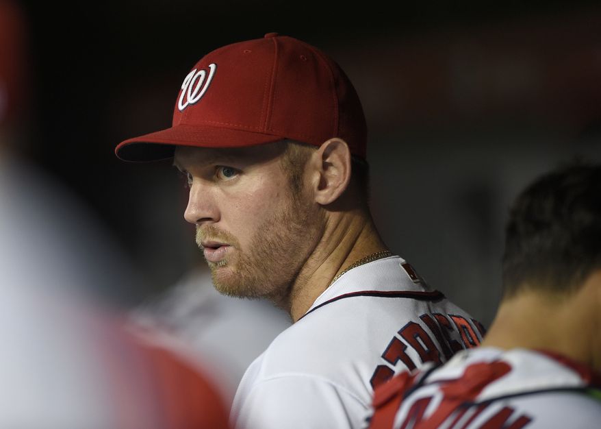 Washington Nationals' Stephen Strasburg looks on before a baseball game against the Arizona Diamondbacks, Tuesday, Sept. 27, 2016, in Washington. (AP Photo/Nick Wass)