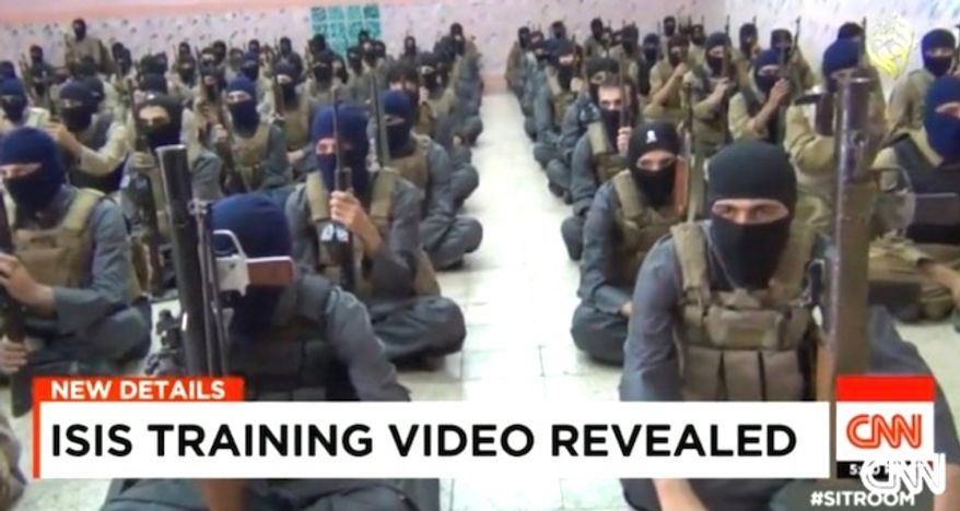 Members of the Islamic State group take part in a training session. (CNN screenshot)