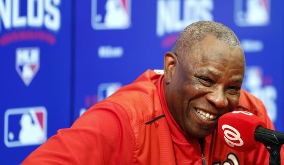 Washington Nationals manager Dusty Baker smiles during a news conference after baseball batting practice at Nationals Park, Tuesday, Oct. 4, 2016, in Washington. The Nationals host the Los Angeles Dodgers in Game 1 of the National League Division Series on Friday. (AP Photo/Alex Brandon)