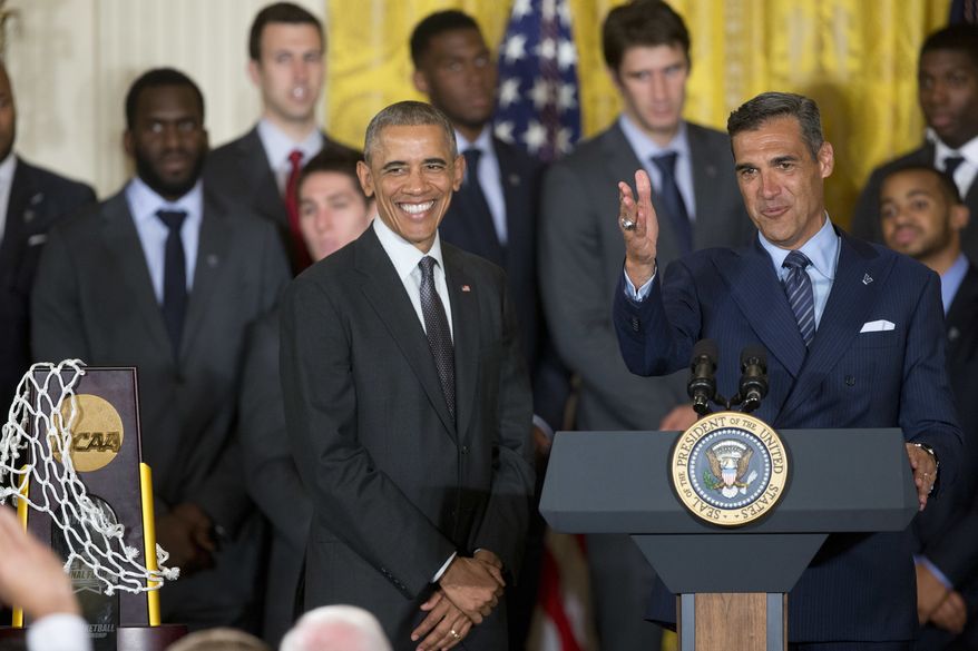 In this May 31, 2016, file photo, President Barack Obama, with Villanova head basketball coach Jay Wright, participate in a ceremony in the East Room of the White House in Washington, honoring the NCAA Champion Villanova Wildcats men's basketball team. Villanova coach Jay Wright has had fun since the Wildcats won the national championship. (AP Photo/Pablo Martinez Monsivais, File)