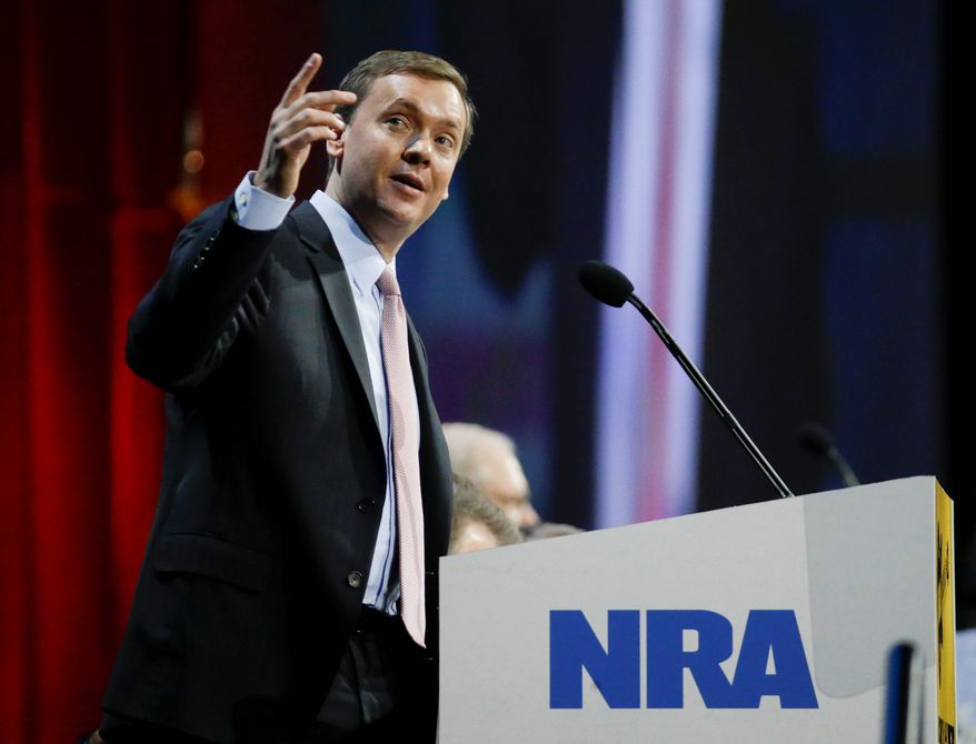 Chris Cox, executive director of the Institute for Legislative Action, the political and lobbying arm of the National Rifle Association, speaks during the annual meeting of members at the NRA convention Saturday, April 11, 2015, in Nashville, Tenn. (AP Photo/Mark Humphrey) ** FILE **