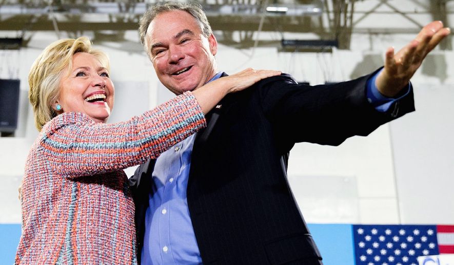 Democratic presidential candidate Hillary Clinton and running mate Sen. Tim Kaine at a rally in Virginia. (Associated press) ** FILE **