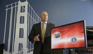 In this photo taken Tuesday, Sept. 27, 2016, FBI Special Agent Jack Bennett answers a question while posing in one of the bureau&#x27;s modernized offices in San Francisco. The FBI’s new leader in San Francisco is a former drug investigator who developed expertise in technology that put him at the center of the government’s effort to unlock an iPhone used by one of the San Bernardino shooters. Bennett now has oversight responsibilities for Silicon Valley. (AP Photo/Eric Risberg)