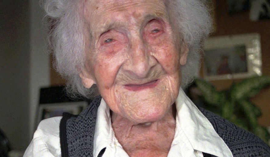 FILE - This Feb. 12, 1996 file photo shows Jeanne Calment in Arles, France. Believed to be the world's oldest person, she died at the age of 122 in 1997. New research published in the journal Nature on Wednesday, Oct. 5, 2016 suggests there’s a limit to our life span and that the odds of breaking Calment’s record are small. (AP Photo/File)