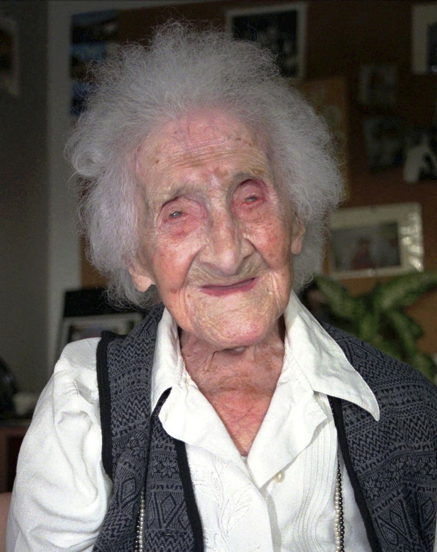 FILE - This Feb. 12, 1996 file photo shows Jeanne Calment in Arles, France. Believed to be the world's oldest person, she died at the age of 122 in 1997. New research published in the journal Nature on Wednesday, Oct. 5, 2016 suggests there’s a limit to our life span and that the odds of breaking Calment’s record are small. (AP Photo/File)