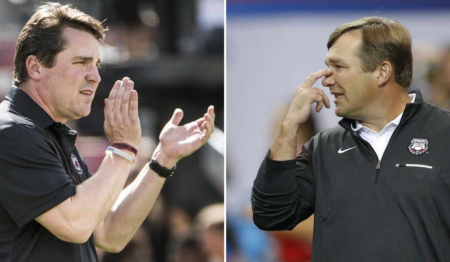 FILE - At left, in a Sept. 17, 2016, file photo, South Carolina head coach Will Muschamp communicates with players before an NCAA college football game against East Carolina, in Columbia, S.C. At right, in a Sept. 3, 2016, file photo, Georgia head coach Kirby Smart gestures as his players warm up before an NCAA college football game against North Carolina in Atlanta. Smart and Muschamp have been friends since they played safety for the Georgia Bulldogs. Now the two coaches are set to meet for the first time Saturday night with Smart back at their alma mater and Muschamp at South Carolina. (AP Photo/File)