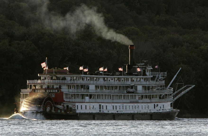 FILE - In this Oct. 21, 2008, file photo, the riverboat Delta Queen moves up the Ohio River. The boat made The National Trust for Historic Preservation's 2016 list of America’s 11 Most Endangered Historic Places, an annual list that spotlights important examples of the nation’s architectural and cultural heritage that are at risk of destruction or irreparable damage. (AP Photo/Al Behrman, File)