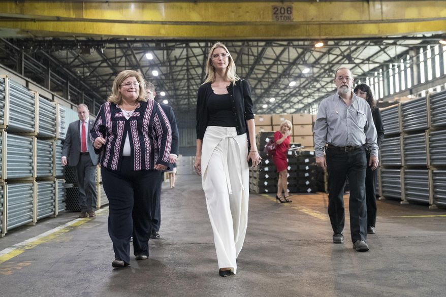 Ivanka Trump, daughter of Republican presidential candidate Donald Trump, center, tours Middletown Tube Works, a welded steel tube supplier, alongside owner Angela Phillips, left, Thursday, Oct. 6, 2016, in Middletown, Ohio. (AP Photo/John Minchillo)