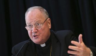 Cardinal Timothy Dolan, Archbishop of New York, speaks to reporters during a news conference in New York, Thursday, Oct. 6, 2016. Dolan helped to announce a new program intended to provide reconciliation and compensation for victims of sexual abuse by clergy. (AP Photo/Seth Wenig) ** FILE **