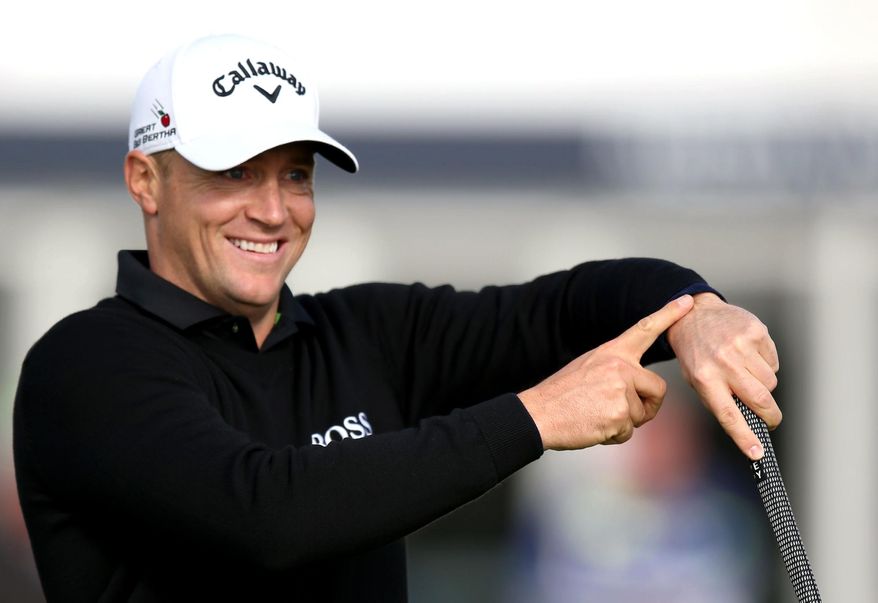 CAPTION CORRECTS THE NAME FROM DAVID TO ALEX Sweden's Alex Noren gestures, on the 18th green during day one of the Dunhill Links Championship, at Carnoustie Golf Links, in Scotland, Thursday Oct. 6, 2016. (Jane Barlow/PA via AP)