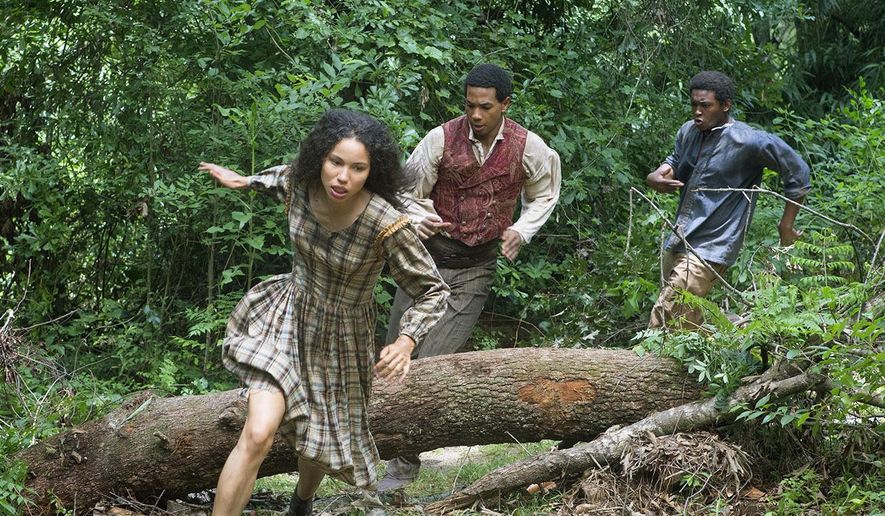 This image released by WGN shows, from left, Jurnee Smollett-Bell, Alano Miller and Renwick Scott in a scene from the drama series, &amp;quot;Underground.&amp;quot; Slavery stories were scarce prior to 2012, but their proliferation has led some to question whether viewers are becoming weary of the genre, or if Hollywood is only finally addressing the oppressive and brutal institution that lasted four centuries and remains part of the country’s legacy today.  (Skip Bolen/Sony Pictures Television via AP)