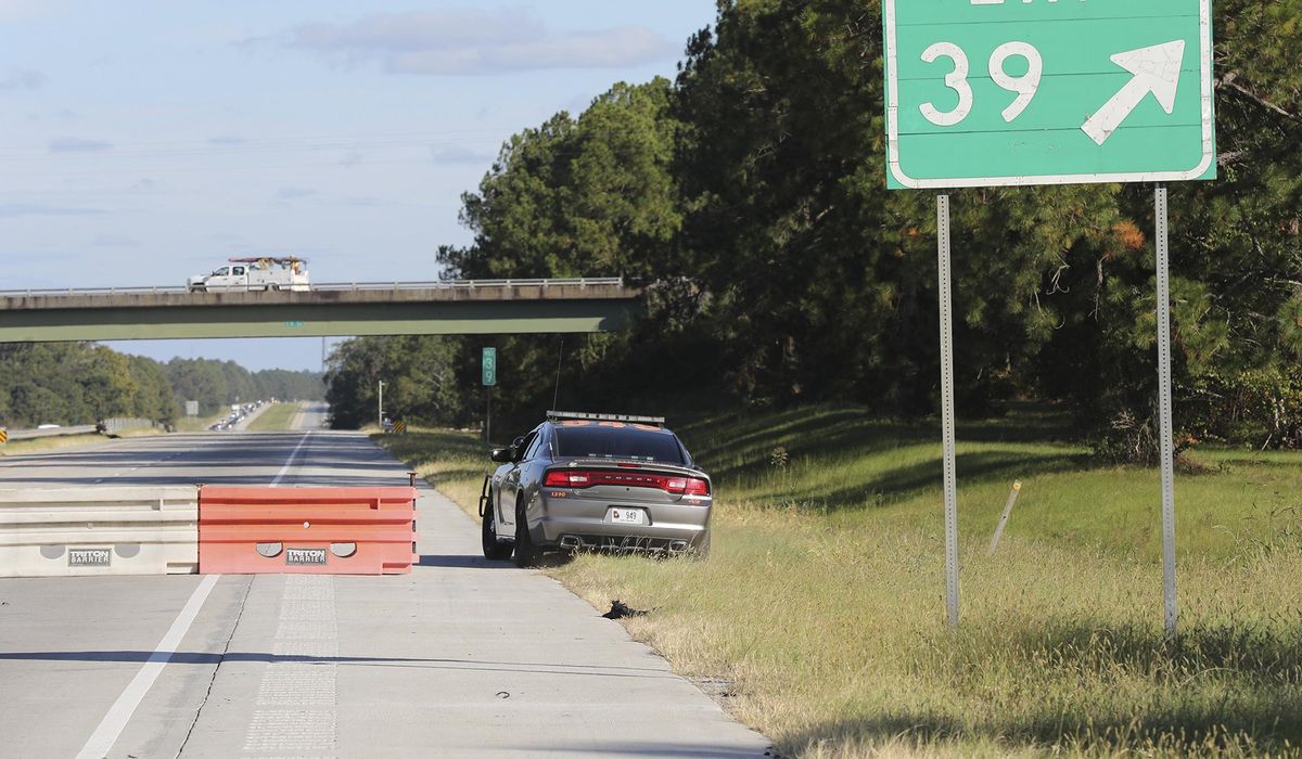 NextImg:Gunman wounded in shootout with Georgia state troopers following street race