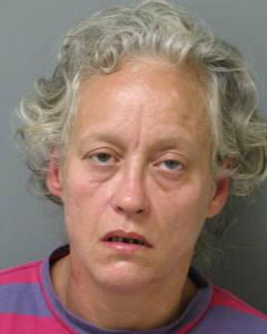 This undated photo provided by the Shelby County, Tenn., Sheriff’s Office shows Carla Hiers of Memphis, Tenn. A video of a couple identified by police as Hiers and her husband passed out on a Memphis street on Oct. 3, 2016, has been viewed nearly 3 million times on Facebook. Police say the couple told them they had snorted heroin. The couple survived and police say Hiers was taken into custody on an outstanding warrant on several charges. (Shelby County Sheriff’s Office via AP)
