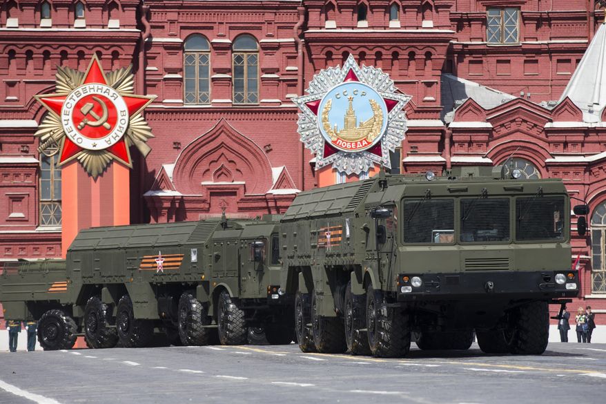 FILE - In this file photo taken on Saturday, May 9, 2015, Iskander missile launchers are driven during the Victory Parade marking the 70th anniversary of the defeat of the Nazis in World War II, in Red Square in Moscow. Poland and Estonia expressed concerns Saturday, Oct. 8, 2016, that Russia has moved nuclear-capable Iskander ballistic missiles into Kaliningrad, a Russian region on the Baltic Sea, with one official saying Russia appears eager to dominate that body of water. (AP Photo/Alexander Zemlianichenko, file)