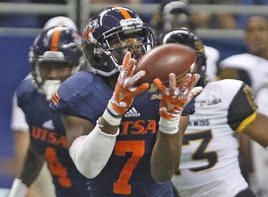 UTSA's Kerry Thomas Jr. hauls in a 71-yard touchdown reception during an NCAA college football game against Southern Mississippi at the Alamodome, Saturday, Oct. 8, 2016, in San Antonio, Texas. (Ron CortesThe San Antonio Express-News via AP)