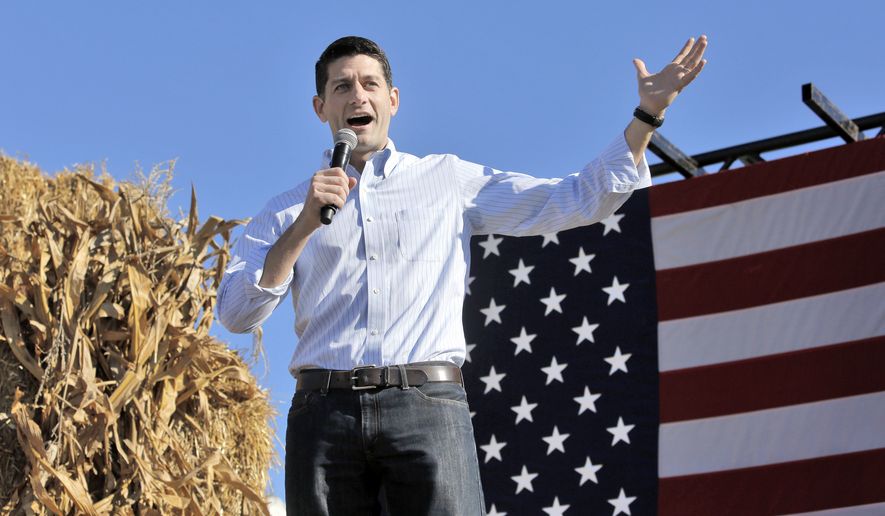 House Speaker Paul Ryan greets the crowd as he takes the stage the 1st Congressional District Republican Party of Wisconsin&#39;s annual Fall Fest event held in Elkhorn, Wis., on Saturday, Oct. 8, 2016. (Anthony Wahl/The Janesville Gazette via AP)