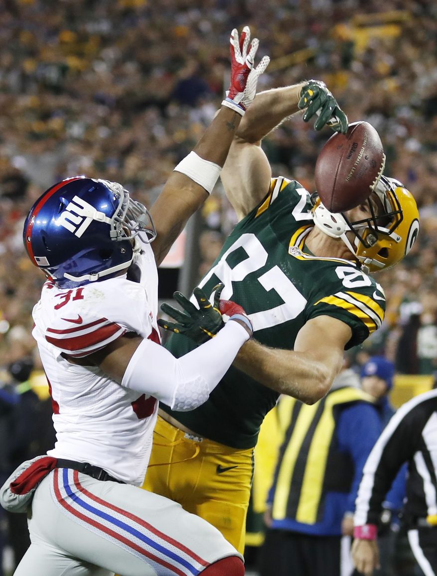 New York Giants' Trevin Wade breaks up a pass intended for Green Bay Packers' Jordy Nelson during the second half of an NFL football game Sunday, Oct. 9, 2016, in Green Bay, Wis. (AP Photo/Matt Ludtke)