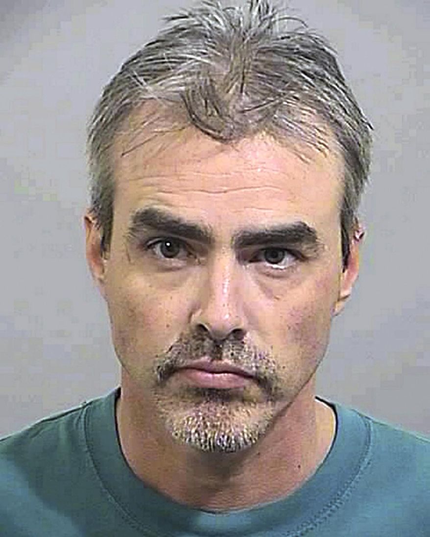 FILE - This 2007 booking file photo provided by the Cumberland County Sheriff's Department shows Sidney Kilmartin, formerly of Windham, Maine. Kilmartin was convicted on Tuesday, Oct. 11, 2016, in federal court in Bangor of mailing cyanide to a suicidal man in England, leading to his death. (Cumberland County Sheriff's Department via AP, File)