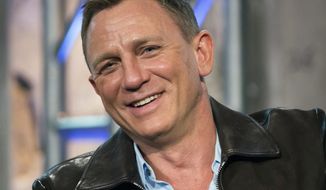 FILE - In this Nov. 5, 2015 file photo, Daniel Craig participates in AOL&#39;s BUILD Speakers Series to discuss the James Bond film &amp;quot;Spectre&amp;quot;, at AOL Studios in New York. Craig told the crowd Friday, Oct. 7, 2016, at the New Yorker Festival that playing 007 is &amp;quot;the best job in the world.&amp;quot; He said that if he were to stop playing the role, he &amp;quot;would miss it terribly.&amp;quot; (Photo by Charles Sykes/Invision/AP, File)