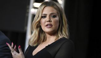 FILE - In this Jan. 6, 2016, file photo, Khloe Kardashian participates in the panel for &amp;quot;Kocktails with Khloe&amp;quot; at the FYI 2016 Winter TCA in Pasadena, Calif. Kardashian said on the &amp;quot;Ellen DeGeneres Show&amp;quot; in an interview broadcast on Tue., Oct. 11, 2016, that her older sister, Kim Kardashian West, is &amp;quot;not doing that well&amp;quot; more than a week after being held up during a Paris jewelry heist. (Photo by Richard Shotwell/Invision/AP, File)