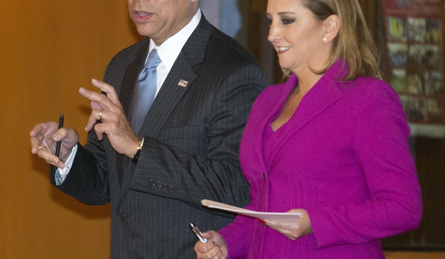 U.S. Homeland Security Secretary Jeh Johnson, left, talks to Mexico's Foreign Affairs Minister Claudia Ruiz Massieu, in Mexico City, Tuesday, Oct. 11, 2016. Johnson said during his visit to Mexico City, some flights to Haiti have been suspended due to Hurricane Matthew. He said Tuesday that U.S. officials will have to "be sympathetic to the plight of the people of Haiti as a result." But after conditions change, "we intend to resume the policy." (AP Photo/Eduardo Verdugo) (AP Photo/Eduardo Verdugo)