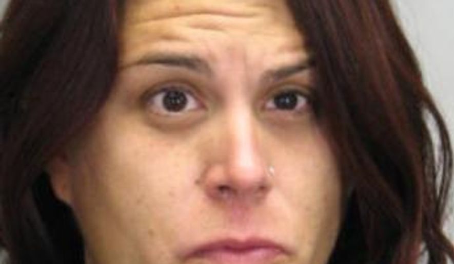 This photo provided the Fairfax County, Va. Police Department News shows Fabiana Ciammaichella. Ciammaichella, 30, and student at a Fairfax County high school have been arrested after police say teamed up to steal a case of beer. (Fairfax County, Va. Police Department News via AP)