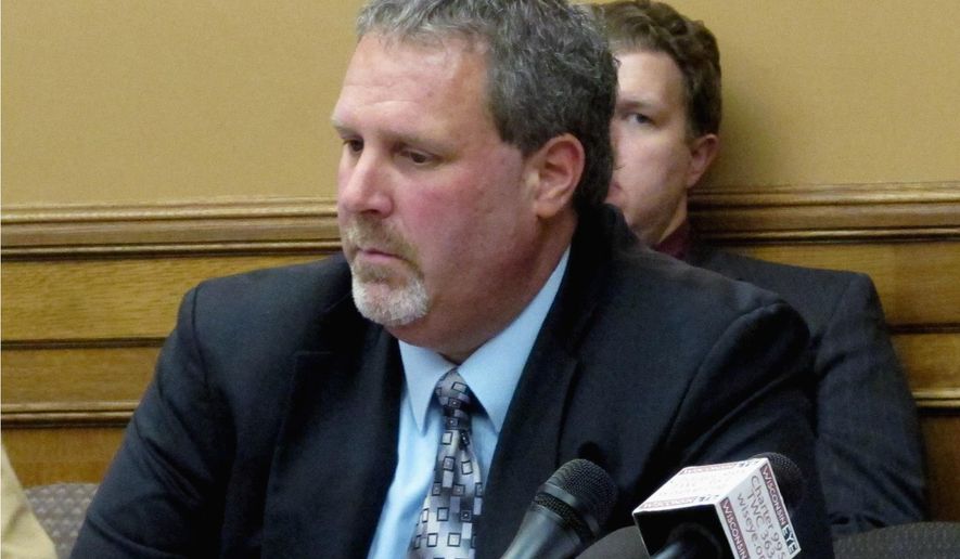 FILE - In this Jan. 7, 2014 file photo, Wisconsin state Sen. Rick Gudex listens to testify in Madison, Wis. Gudex, a Republican from Fond du Lac, died on Wednesday, Oct. 12, 2016, the Fond du Lac County sheriff’s department said. He was 48. (AP Photo/Scott Bauer, File)