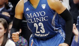 Minnesota Lynx’s Maya Moore cheers her team during the second half of Game 2 of the WNBA basketball finals Tuesday, Oct. 11, 2016, in Minneapolis. The Lynx defeated the Los Angeles Sparks 79-60. Moore led the Lynx with 21 points. (AP Photo/Jim Mone)