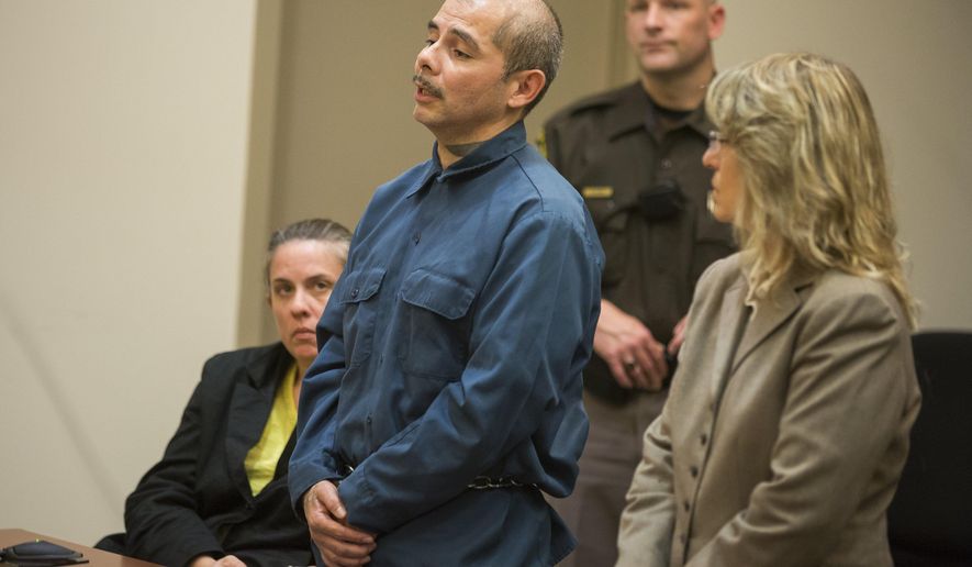 Juan Cantu addresses Judge Paul J. Sullivan at a hearing for his resentencing at the Kent County Courthouse in Grand Rapids on Wednesday, Oct. 12, 2016. Cantos, who was sentenced to life in prison without parole in a 1995 slaying that took place when he was 16 has been given a shorter sentence. Cantu was recommended for re-sentencing after the U.S. Supreme Court determined mandatory no-parole sentences are a cruel and unusual punishment for minors.  (Allison Farrand/The Grand Rapids Press-MLive.com via AP)