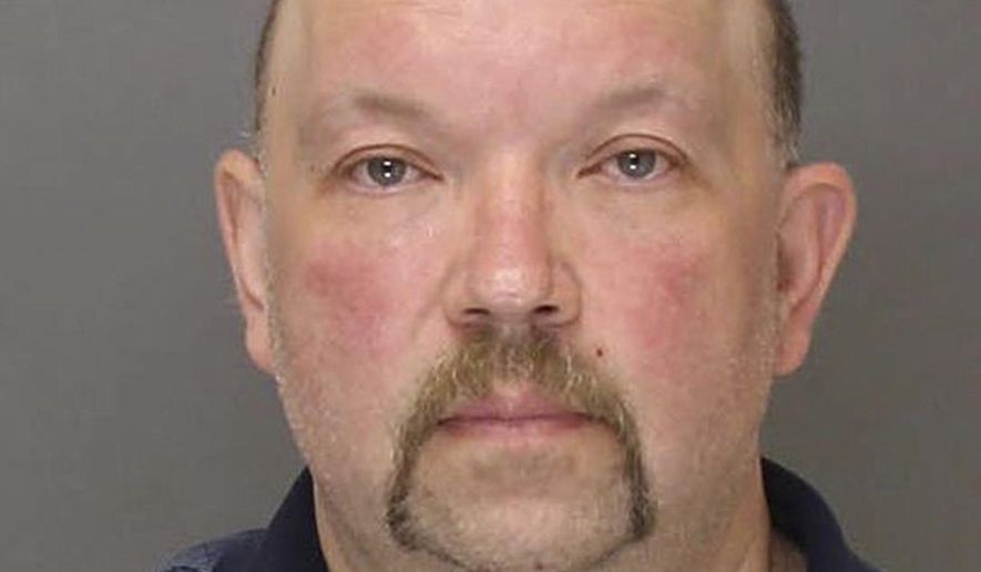 This May 2016 booking photo provided by the Lehigh County DUI Processing Center shows Michael Horvath of Saylorsburg, Pa. Horvath was arrested Thursday, Oct. 13, 2016, after investigators say they found a bone on his property matching the DNA of Holly Grim, a woman last seen in November 2013 who was a co-worker of Horvath at a church organ manufacturer. (Lehigh County DUI Processing Center via AP)