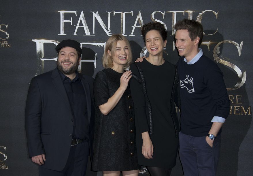 Actors Dan Fogler, from left, Alison Sudol, Katherine Waterston and Eddie Redmayne pose for photographers upon arrival at the photo call of the film 'Fantastic Beasts and Where to Find Them', at a central London hotel, Thursday, Oct. 13, 2016. (Photo by Joel Ryan/Invision/AP)