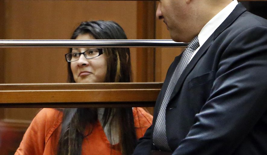 FILE - In this Jan. 12, 2015, file photo, Alejandra Guerrero, left, appears in Los Angeles Superior Court with her attorney Errol Cook, right. Guerrero was found guilty of first-degree murder and other charges Thursday, Oct. 13, 2016, in the beating death of a Chinese graduate student at the University of Southern California as he walked home after a late-night study session. Guerrero was the first of four people to be tried in the slaying of 24-year-old Xinran Ji during a robbery attempt in 2014. (Al Seib /Los Angeles Times via AP, Pool, File