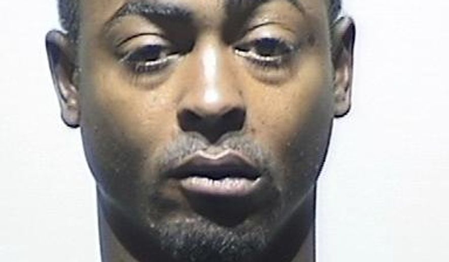 FILE- This booking photo provided by the Wayne County Sheriff shows Michael Montgomery, who was arraigned via video conference, Wednesday, Oct. 21, 2015, in district court in Detroit, for crimes committed in 2005-2006, including sexual assault, kidnapping and a fatal stabbing. Montgomery was sentenced to 40 to 80 years in prison, Thursday, Oct. 13 in Detroit. (Wayne County Sheriff via AP)