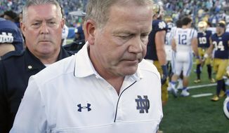 FILE - In this Sept. 24, 2016, file photo, Notre Dame head coach Brian Kelly walks off the field after an NCAA college football game against Duke, in South Bend, Ind. Duke defeated Notre Dame 38-35. When crunch time comes, the Irish offense is the one being crunched. The Irish (2-4) have had four chances to win or tie on their last possessions this season. They are 0-for-4. (AP Photo/Charles Rex Arbogast, File)