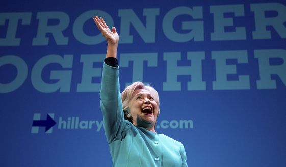 Democratic presidential candidate Hillary Clinton waves as she takes the stage to speak at a fundraiser at the Paramount Theatre in Seattle, Friday, Oct. 14, 2016. (AP Photo/Andrew Harnik) ** FILE **