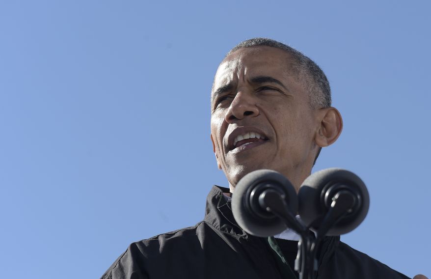 President Barack Obama speaks at a campaign rally for Democratic presidential candidate Hillary Clinton, Friday, Oct. 14, 2016, at the Cleveland Burke Lakefront Airport in Cleveland, Ohio. (AP Photo/Susan Walsh)