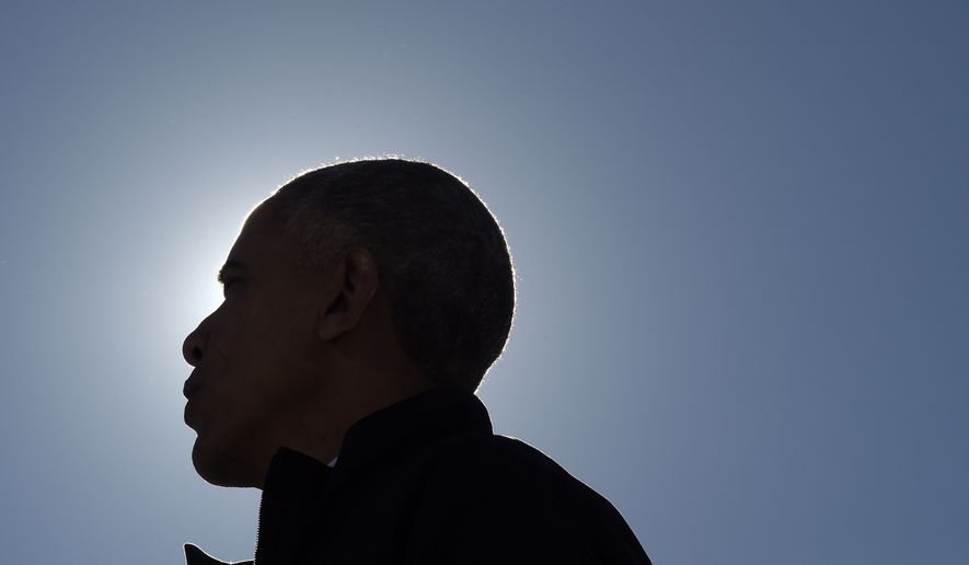 President Barack Obama speaks at a campaign rally for Democratic presidential candidate Hillary Clinton, Friday, Oct. 14, 2016, at the Cleveland Burke Lakefront Airport in Cleveland, Ohio. (AP Photo/Susan Walsh)