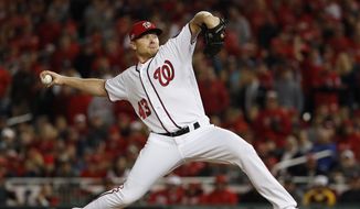 Washington Nationals relief pitcher Mark Melancon throws to a Los Angeles Dodgers batter during the eighth inning of Game 5 of a baseball National League Division Series, at Nationals Park on Thursday, Oct. 13, 2016, in Washington. (AP Photo/Pablo Martinez Monsivais)