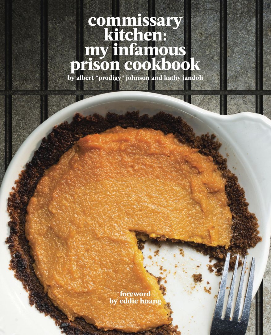 This book cover image released by Infamous Books shows "Commissary Kitchen: My Infamous Prison Cookbook," by rapper Albert Johnson, better known as rapper Prodigy, and Kathy Iandoli. The book contains prison recipes and memories of the rapper's time on the inside. (Infamous Boos via AP)