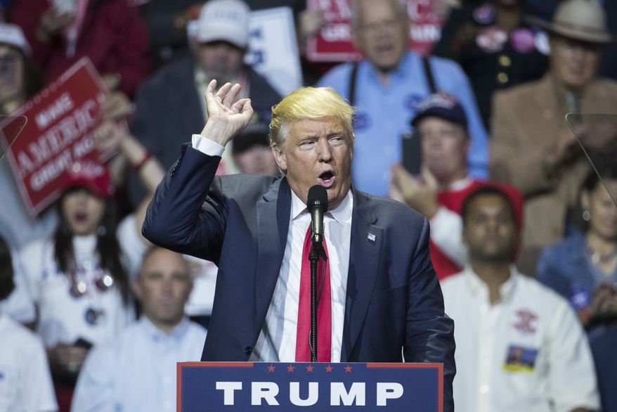Republican presidential candidate Donald Trump speaks during a campaign rally, Thursday, Oct. 13, 2016, in Cincinnati. (AP Photo/John Minchillo)