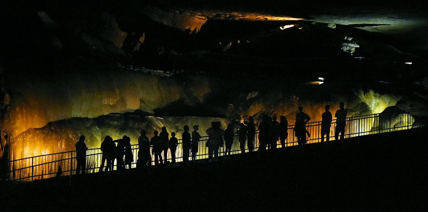 FILE - In this Sept. 9, 2016 file photo, tourist look over Cathedral Caverns State Park in Woodville, Ala. Alabama voters on Election Day will have their say on 14 proposed statewide amendments. One of those is aimed at protecting money for Alabama’s 21 state parks. Amendment 2 would prohibit money generated at state parks_ as well as tax dollars earmarked for park maintenance _ from being transferred to other government functions. It would also allow more private entities to run hotels, golf courses and restaurants at the parks. (Joe Songer /AL.com via AP)