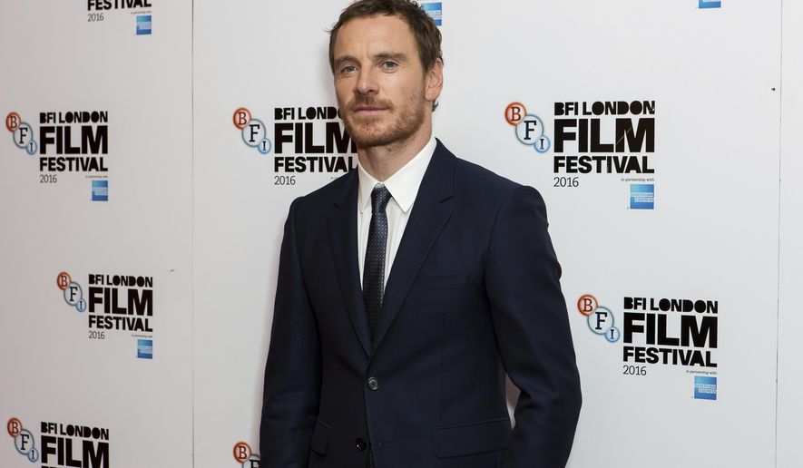 Actor Michael Fassbender poses for photographers upon arrival at the premiere of the film 'Trespass Against Us', showing as part of the London Film Festival in London, Friday, Oct. 14, 2016. (Photo by Grant Pollard/Invision/AP)