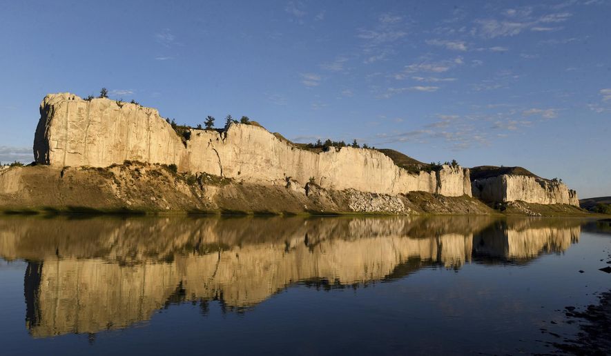 This Sept. 28, 2016 photo shows the White Cliffs reflect off the Missouri river in Montana. It's been 40 years since Montana has added any Wild and Scenic Rivers, a point river advocates are trying to change and get the East Rosebud Creek added by year's end. (Kurt Wilson /The Missoulian via AP)