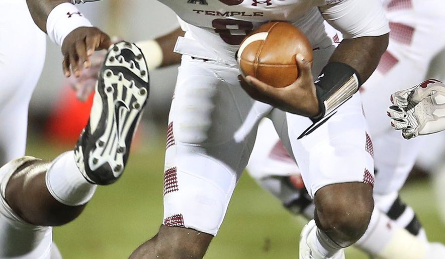 Temple quarterback Phillip Walker scrambles against Central Florida during an NCAA college football game in Orlando, Fla., on Saturday, Oct. 15, 2016. (Stephen M. Dowell/Orlando Sentinel via AP)
