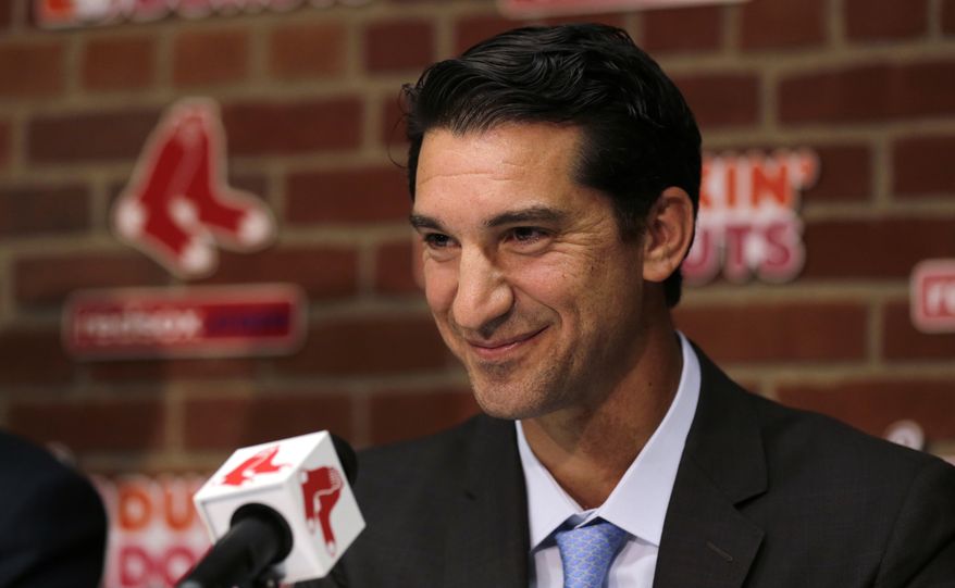 FILE - In this Sept. 24, 2015, file photo, Boston Red Sox newly appointed general manager Mike Hazen smiles at Fenway Park in Boston. The Arizona Diamondbacks have named Hazen as executive vice president and general manager. The team announced the hiring in a news release on Sunday, Oct. 16, 2016. (AP Photo/Charles Krupa, File)