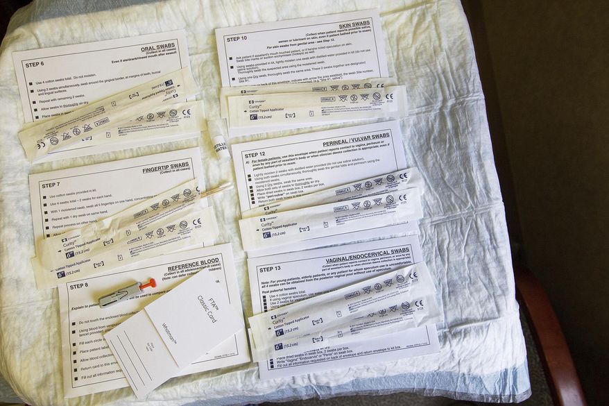In this Friday, Oct. 7, 2016 photo, a standard testing kit used in rape cases is laid out on a table at Yakima Valley Memorial Hospital in Yakima, Wash. Hospital nurses are often the first point of contact for victims of rape and sexual assault and are responsible for collecting the initial physical evidence. (Shawn Gust /Yakima Herald-Republic via AP)