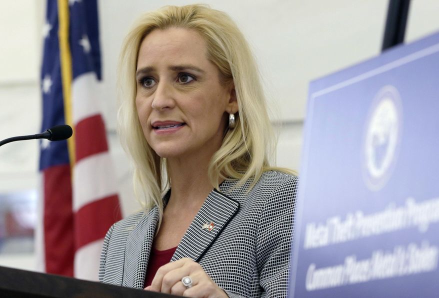 FILE - In this July 9, 2015 file photo, Arkansas Attorney General Leslie Rutledge speaks at a news conference at the Arkansas state Capitol in Little Rock. Rutledge is launching her re-election bid, joining a growing list of Arkansas statewide elected officials preparing for the 2018 campaign. Rutledge told The Associated Press last week that she has already begun raising money for her bid and will file her first fundraising report with state election officials on Monday, Oct. 17, 2016. (AP Photo/Danny Johnston, File)