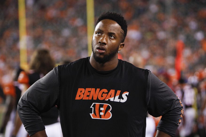FILE - In this Aug. 29, 2015, file photo, Cincinnati Bengals offensive tackle Cedric Ogbuehi stands on the sidelines in the first half of an NFL preseason football game against the Chicago Bears, in Cincinnati. Ogbuehi got benched once in college for a subpar play. It happened again during the Bengals' loss in New England as the first-year starter struggled. He expects to be back in the lineup against Cleveland on Sunday. (AP Photo/Frank Victores, File)